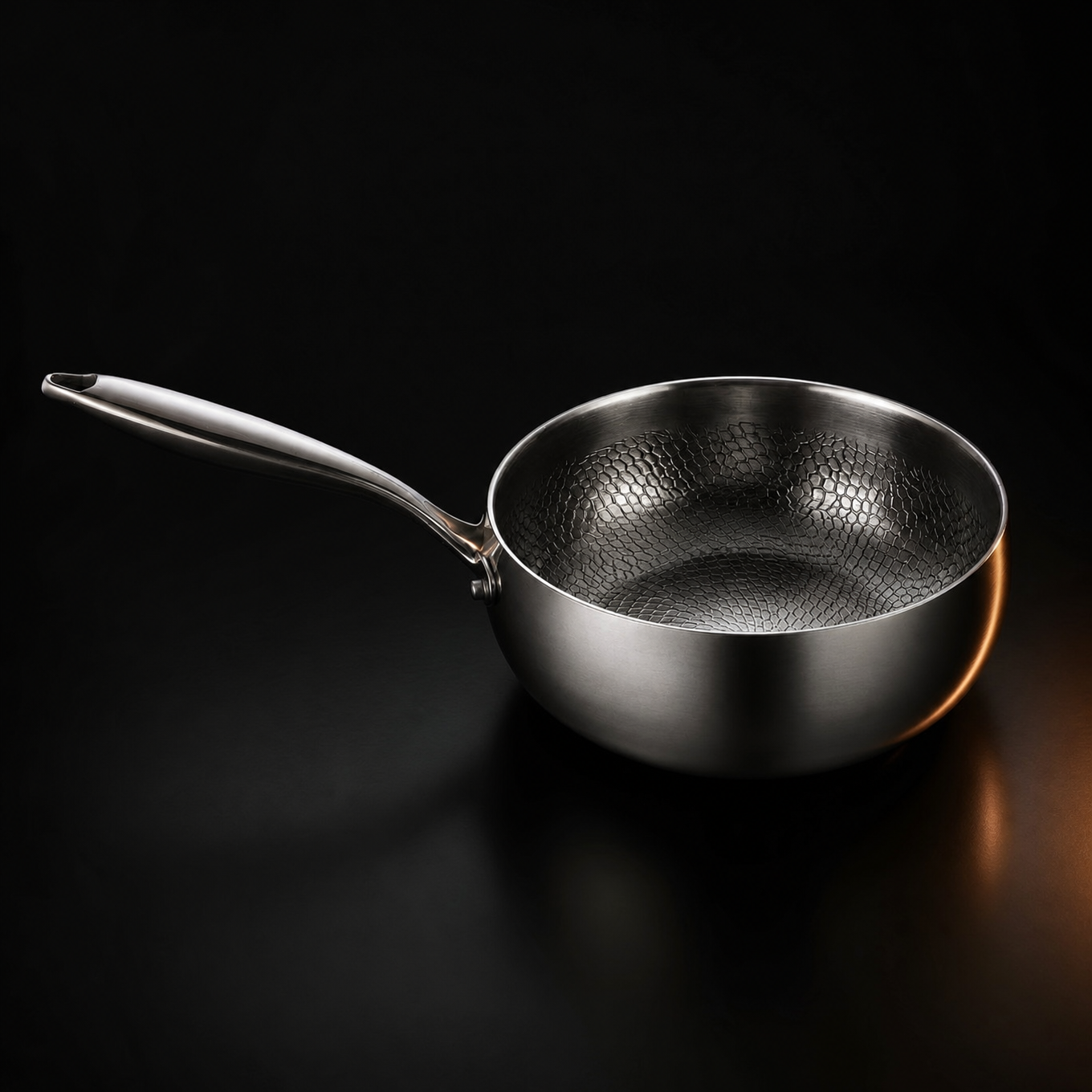 Hand-hammered titanium sauté pan with high walls, PFAS-free non-stick cookware by Okura