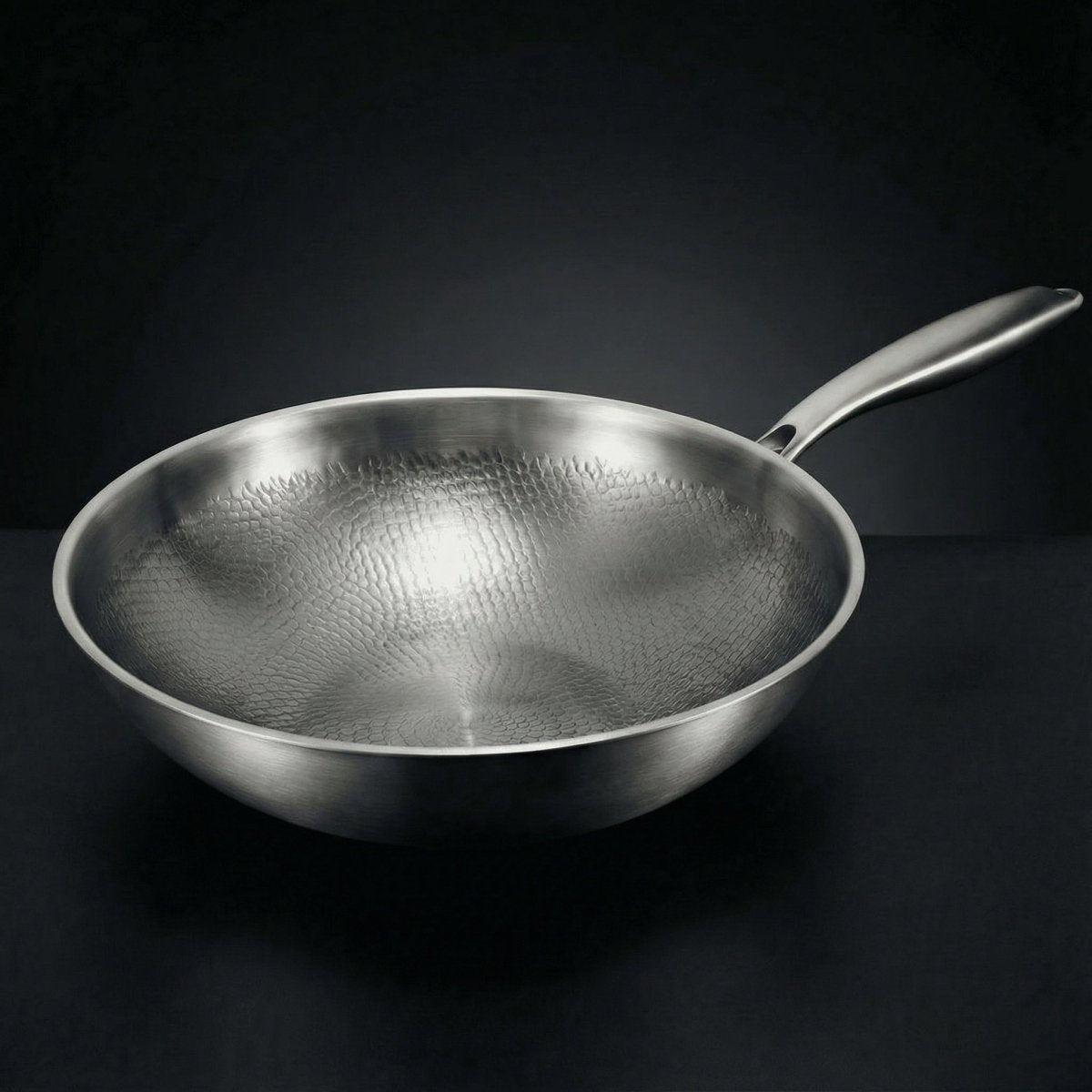 Hand-hammered flat-base titanium wok pan stir-frying, PFAS-free cookware by Okura